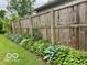 Backyard wooden fence with landscaping provides privacy to the property at 1998 Crescent St, Franklin, IN 46131