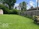 Spacious backyard with a storage shed and well-maintained lawn, ideal for outdoor activities at 1998 Crescent St, Franklin, IN 46131