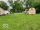 Lush backyard with lawn and shed, offering a peaceful outdoor retreat at 1998 Crescent St, Franklin, IN 46131