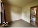 Bedroom featuring neutral walls, carpet, and a window offering natural light at 1998 Crescent St, Franklin, IN 46131