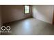 Bedroom featuring neutral walls and a window offering natural light at 1998 Crescent St, Franklin, IN 46131