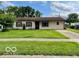 Charming single-story home with a well-manicured lawn and inviting curb appeal at 1998 Crescent St, Franklin, IN 46131