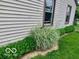 Lawn showing exterior of home with green shrubs alongside at 1998 Crescent St, Franklin, IN 46131