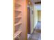 Hallway featuring built in shelving and wood flooring at 1998 Crescent St, Franklin, IN 46131