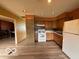 Well-lit kitchen with classic wooden cabinets and modern appliances at 1998 Crescent St, Franklin, IN 46131