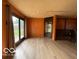 Spacious living room with sliding glass doors and lots of natural light at 1998 Crescent St, Franklin, IN 46131
