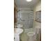Standard bathroom featuring dual vanities, tub/shower combination, and toilet at 202 S Church St, Brooklyn, IN 46111