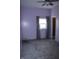 Bedroom with ample natural light and closet access at 202 S Church St, Brooklyn, IN 46111