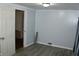 Cozy bedroom featuring new floors, fresh paint and neutral decor at 202 S Church St, Brooklyn, IN 46111