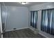 Clean bedroom with fresh paint, new floors, and minimalist lighting at 202 S Church St, Brooklyn, IN 46111