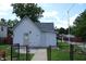 Charming one story home featuring white siding and a well-maintained front yard at 202 S Church St, Brooklyn, IN 46111