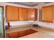 This kitchen features wood cabinetry, countertops, and modern appliances at 202 S Church St, Brooklyn, IN 46111