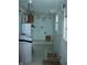 Laundry room with washing machine, dryer and water softener at 202 S Church St, Brooklyn, IN 46111
