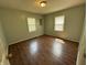 Bedroom with laminate flooring and natural light at 2133 10Th St, Columbus, IN 47201