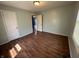 Bedroom with laminate flooring and a double closet at 2133 10Th St, Columbus, IN 47201