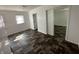 Bright bedroom featuring resilient flooring, updated paint, and ample space at 2310 E Raymond St, Indianapolis, IN 46203