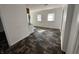 Spacious eat-in kitchen area featuring resilient flooring, great natural light, and a washer/dryer hook up at 2310 E Raymond St, Indianapolis, IN 46203