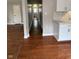 Hallway between kitchen and living space with view to the bathroom at , Beech Grove, IN 46107