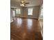 Spacious living room area with hardwood floors and open access to kitchen and dining areas at , Beech Grove, IN 46107