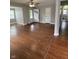 Inviting living room with hardwood floors, two doorways and natural light at , Beech Grove, IN 46107