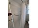 Bright shower space with safety grab bar and built in shelves at , Beech Grove, IN 46107
