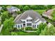 Aerial view of a two-story home in a lush green setting with mature trees at 2535 Dawn Ridge Dr, Westfield, IN 46074