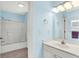 Clean bathroom with a shower-tub combo, modern lighting, and tiled floors at 2535 Dawn Ridge Dr, Westfield, IN 46074