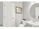 Clean half bathroom with pedestal sink, toilet, and neutral wall color at 2535 Dawn Ridge Dr, Westfield, IN 46074