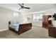 Cozy bedroom with natural light, carpet floors, furniture, and neutral color palette at 2535 Dawn Ridge Dr, Westfield, IN 46074