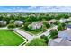 Attractive aerial view of a home with a well-manicured lawn and mature trees in a residential neighborhood at 2535 Dawn Ridge Dr, Westfield, IN 46074