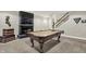 Game room featuring a pool table and fireplace with mounted TV at 2535 Dawn Ridge Dr, Westfield, IN 46074