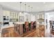 Gourmet kitchen with large island, stainless steel appliances, and custom cabinetry offers a chef's dream at 2535 Dawn Ridge Dr, Westfield, IN 46074