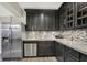 Kitchenette featuring a stainless steel refrigerator and dark cabinets at 2535 Dawn Ridge Dr, Westfield, IN 46074