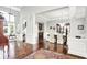 Spacious living areas showcasing elegant columns, hardwood floors, and a seamless flow between rooms at 2535 Dawn Ridge Dr, Westfield, IN 46074