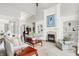 Open-concept living room boasts a fireplace, built-in shelves, and an airy, light-filled atmosphere at 2535 Dawn Ridge Dr, Westfield, IN 46074
