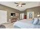 Bright main bedroom with a TV, sitting area and an en-suite bathroom at 2535 Dawn Ridge Dr, Westfield, IN 46074