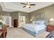 Comfortable main bedroom with en-suite bathroom featuring a separate tub and shower at 2535 Dawn Ridge Dr, Westfield, IN 46074