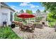 Beautiful outdoor living space with stone fireplace, pergola, and dining area with seating at 2535 Dawn Ridge Dr, Westfield, IN 46074
