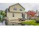 Backyard featuring a cozy patio, outdoor furniture, and lush greenery at 28 N Elizabeth St, Indianapolis, IN 46219