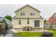 A backyard with a table and chairs, along with a patio and a grill for outdoor entertaining at 28 N Elizabeth St, Indianapolis, IN 46219