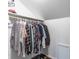 Walk-in closet featuring a hanging rod with plentiful storage for clothes and accessories at 28 N Elizabeth St, Indianapolis, IN 46219