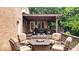 Cozy deck featuring a fire pit with outdoor chairs creates a warm and inviting outdoor gathering spot at 3295 Allison Ct, Carmel, IN 46033