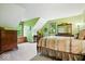 Spacious bedroom with green walls, carpet, and windows at 3295 Allison Ct, Carmel, IN 46033