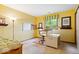 Bedroom featuring yellow walls, carpet and a desk at 3295 Allison Ct, Carmel, IN 46033