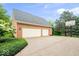 A large two car garage and basketball court provides ample parking and recreational opportunities at 3295 Allison Ct, Carmel, IN 46033