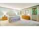 Spacious main bedroom features neutral decor, natural light, and ample closet space at 3295 Allison Ct, Carmel, IN 46033