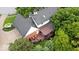 Stunning aerial view of backyard featuring wooden deck with fire pit and stylish outdoor furniture at 3295 Allison Ct, Carmel, IN 46033