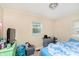 Neutral bedroom with two windows and a blue comforter at 3338 Orchard Ave, Indianapolis, IN 46218