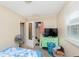 Neutral bedroom with closet, fan, and TV at 3338 Orchard Ave, Indianapolis, IN 46218