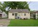 Charming home with a cozy backyard, manicured lawn, and a welcoming entrance, perfect for relaxed living at 3338 Orchard Ave, Indianapolis, IN 46218